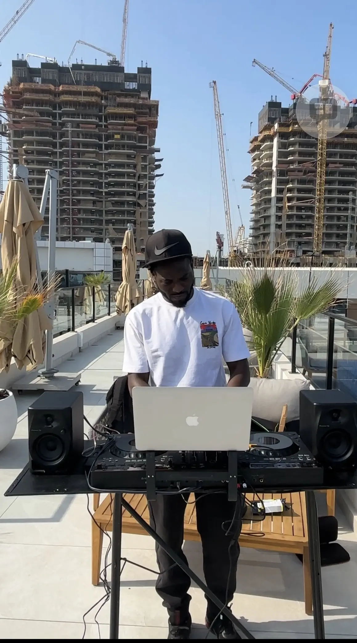 DJ Christerna playing music at an outdoor wedding and engagement party in Dubai