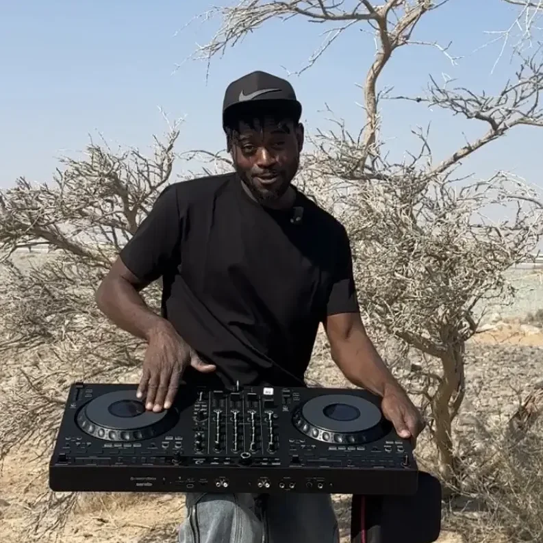 DJ Christerna performing an outdoor set in the UAE desert